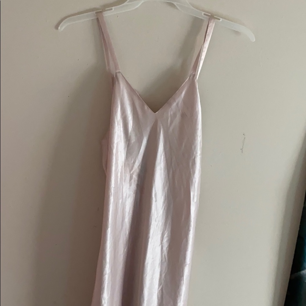 Long , pink silky lingerie dress .